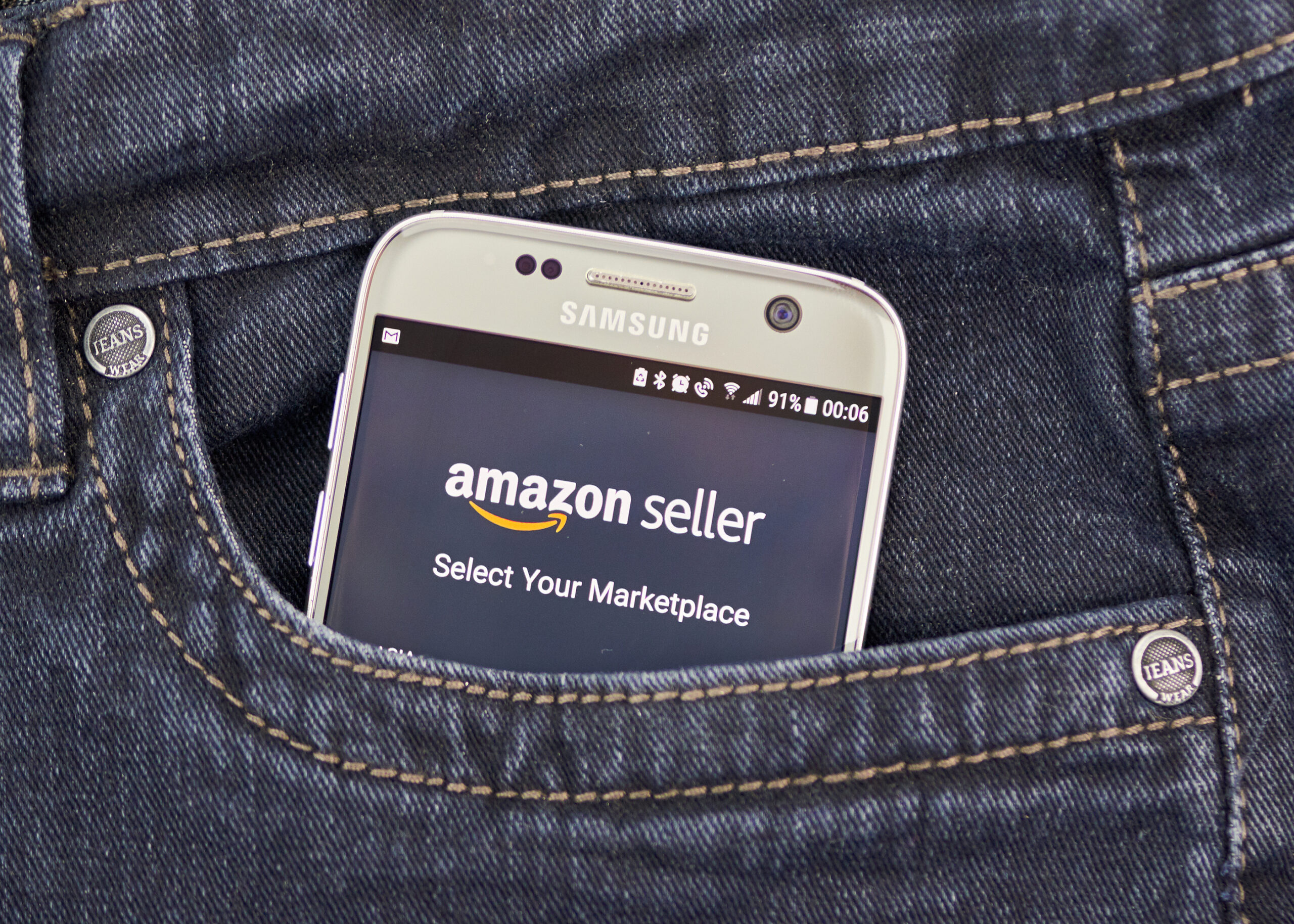 A smartphone with the Amazon Seller app open